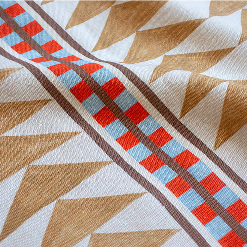 #dune Menkaure outdoor fabric in Dune, draped to show the print in close detail
