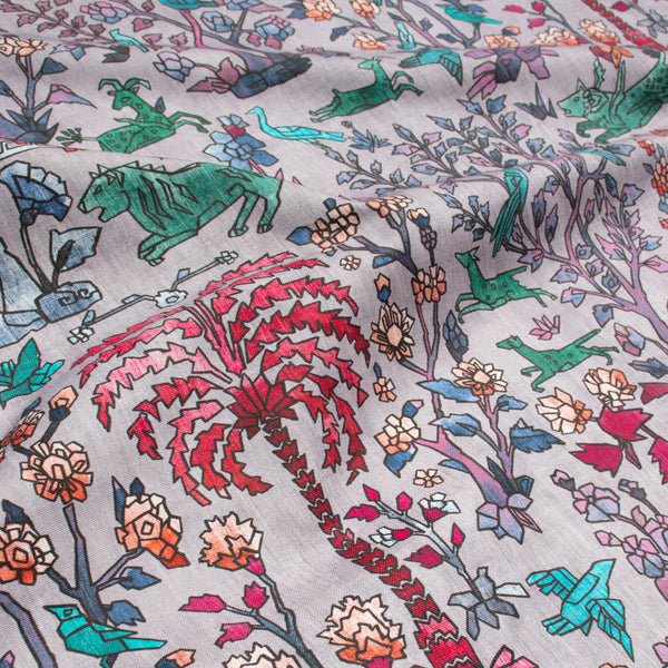 #lilac Mighty Jungle outdoor fabric in Lilac, draped to show the print in close detail