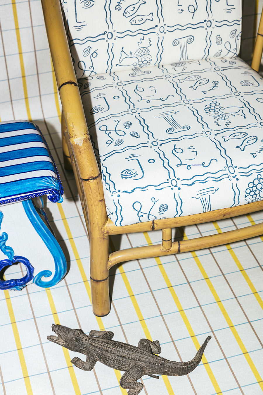 Vale London alligator print fabric on a rattan chair