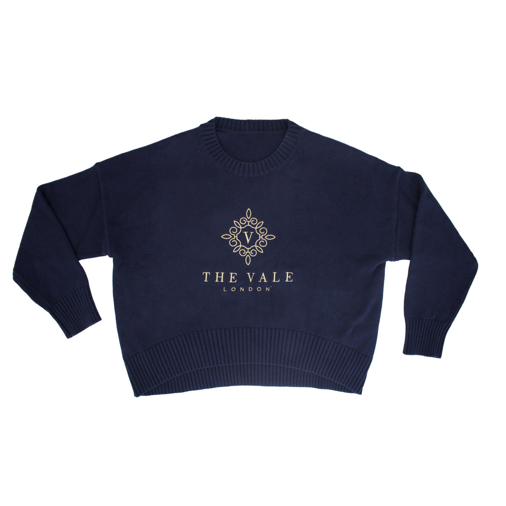 Embroidered Crewneck Sweater in navy organic cotton with gold logo embroidery, shown flat on a white background