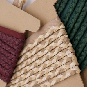 #all Fletta raffia braided cord trim in Oxblood, Latte and Forest, shown on kraft card