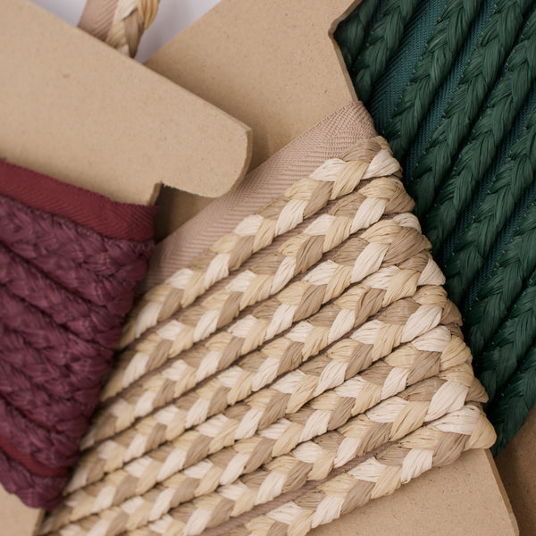 #all Fletta raffia braided cord trim in Oxblood, Latte and Forest, shown on kraft card