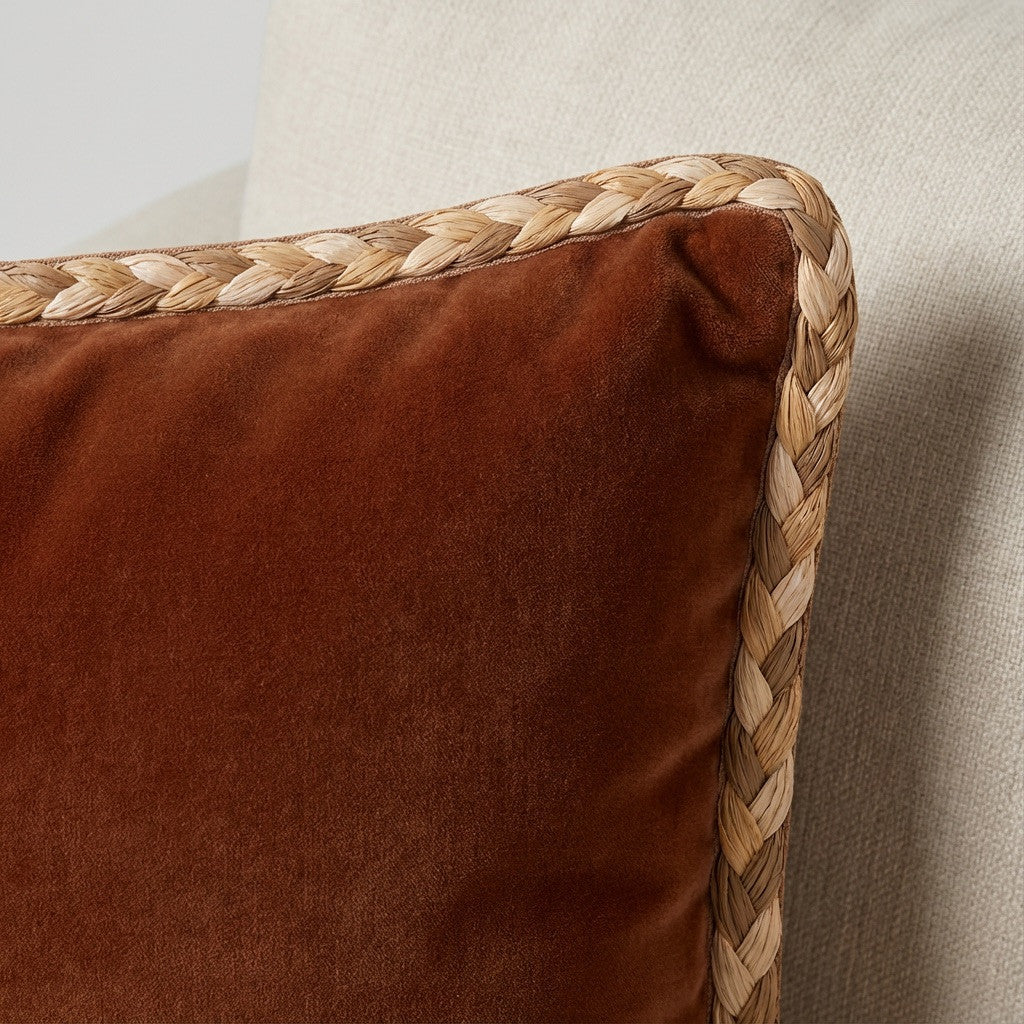 Fletta raffia braided cord by The Vale London trimming a cushion