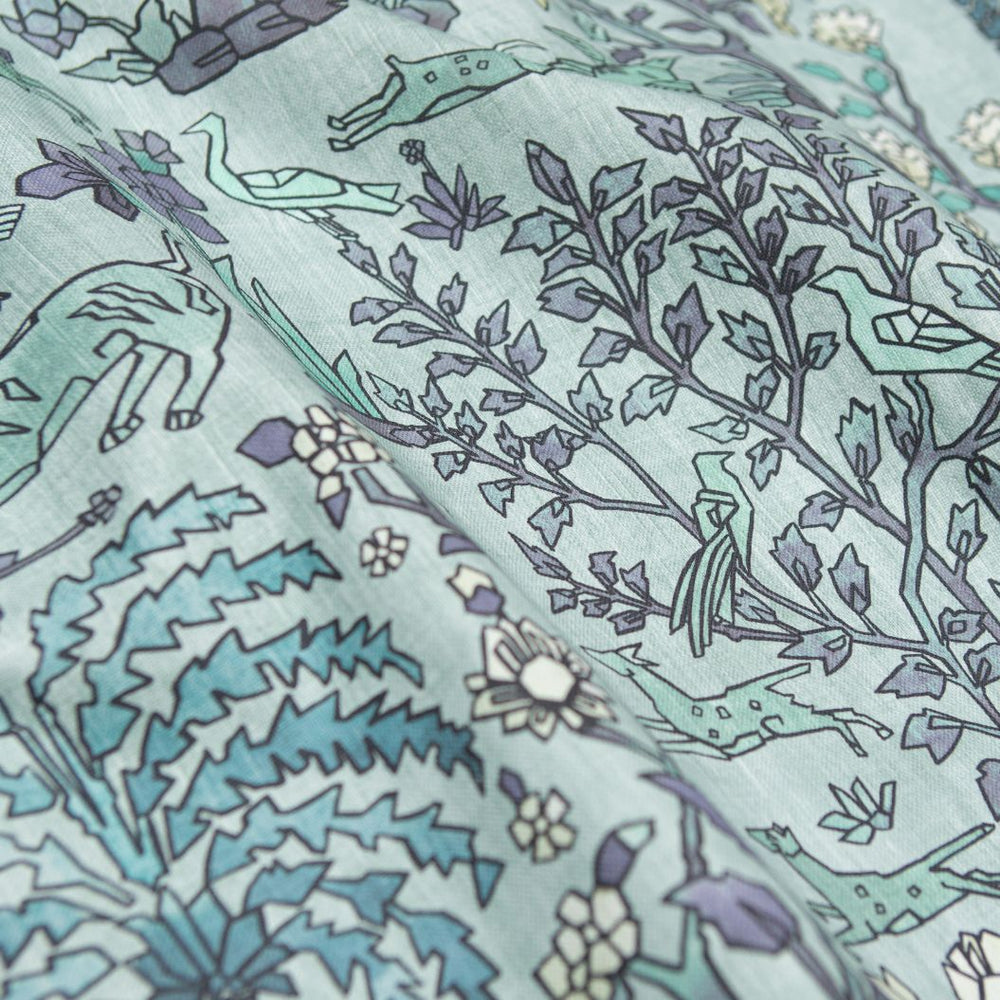 #lagune Mighty Jungle Cotton fabric in Lagune by The Vale London