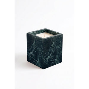 Jade Candle in a natural green marble vessel, shown against a white background