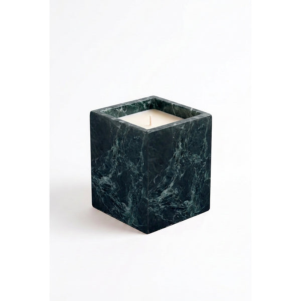 Jade Candle in a natural green marble vessel, shown against a white background