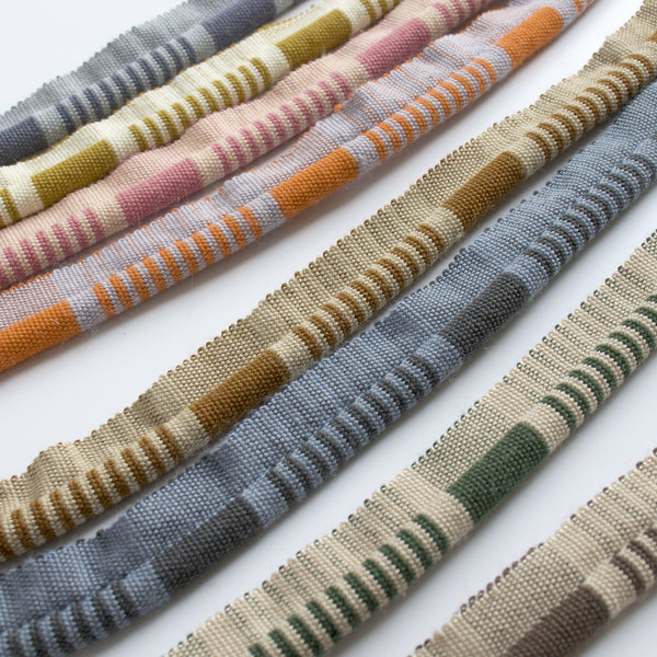 #all Linea ribbed wool cord trim shown in all eight colourways, laid side by side