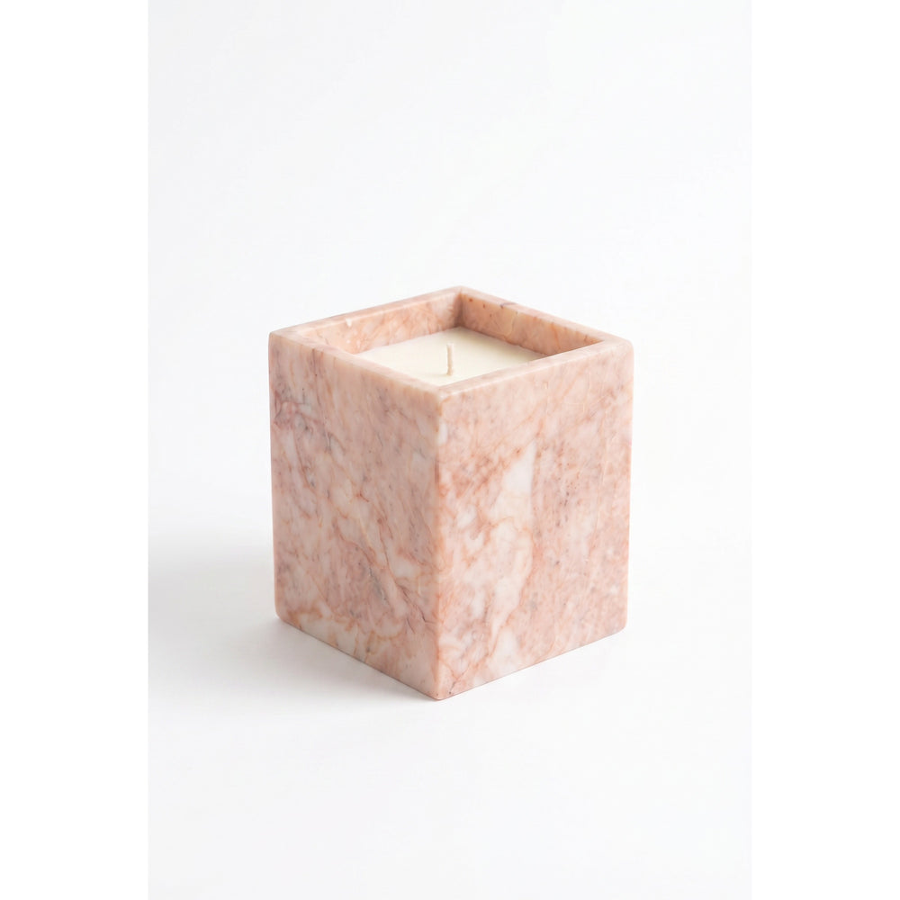 Rose Quartz Candle in a natural pink marble vessel, shown against a white background